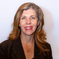 Headshot of Aimee Rinehart on a white background