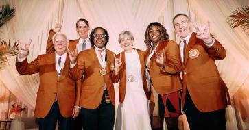 A group of winners at the Texas Exes Distinguished Alumnus Awards presentation event. Fran Harris is second from right.