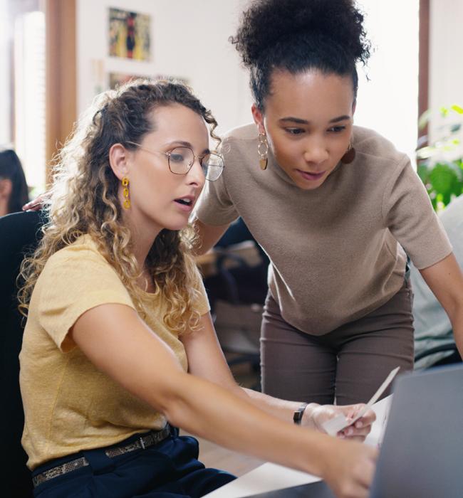 two professional women working together