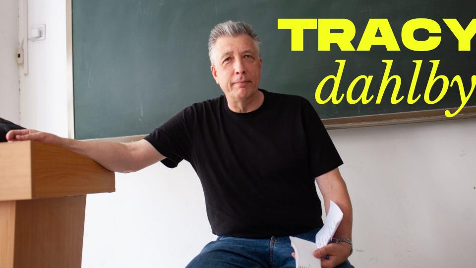 Tracy Dahlby sits in a classroom at a university in Shanghai during a Reporting China Maymester. Dahlby will retire from the School of Journalism and Media following the Spring 2022 semester.
