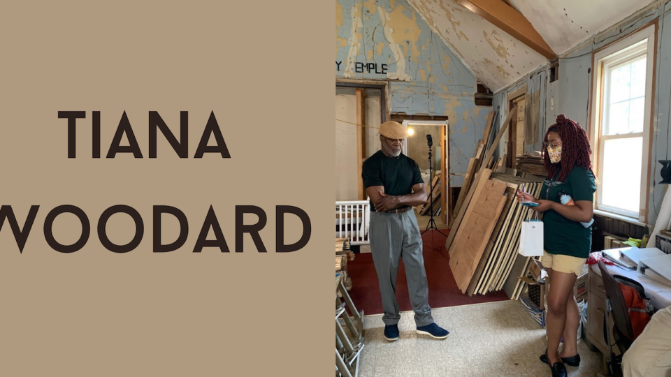 Tiana Woodard, standing doing an interview as a man films on the right. Text on the left says, "Tiana Woodard."