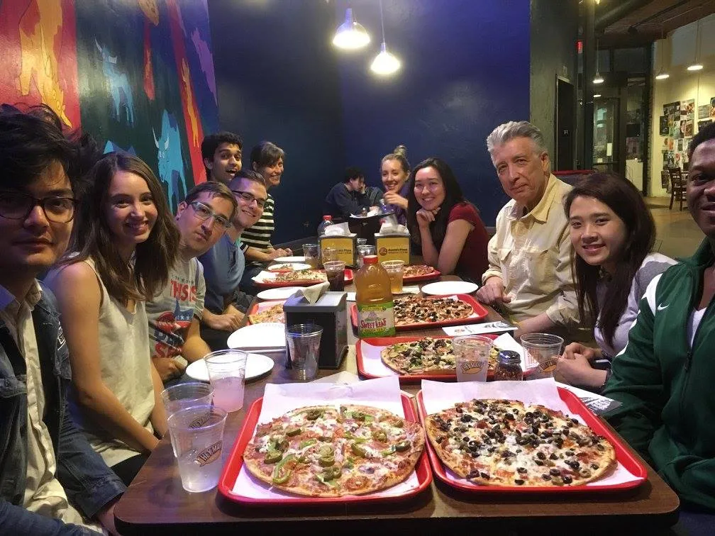 Dahlby and a group of students enjoy pizza on and end-of-semester outing he calls “Fun Day.” Dahlby and a group of students enjoy pizza on and end-of-semester outing he calls “Fun Day.”