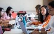 UT students sit in belo working on the 2018 Moody Hacks hackathon