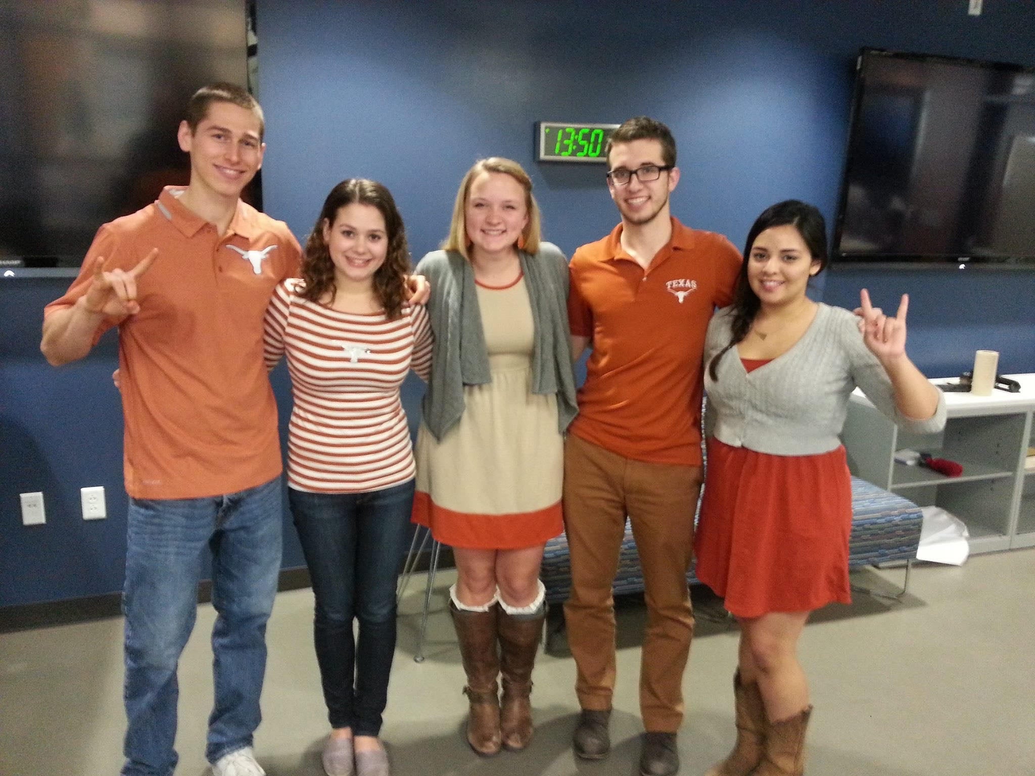 Adam Beard poses with his group project team